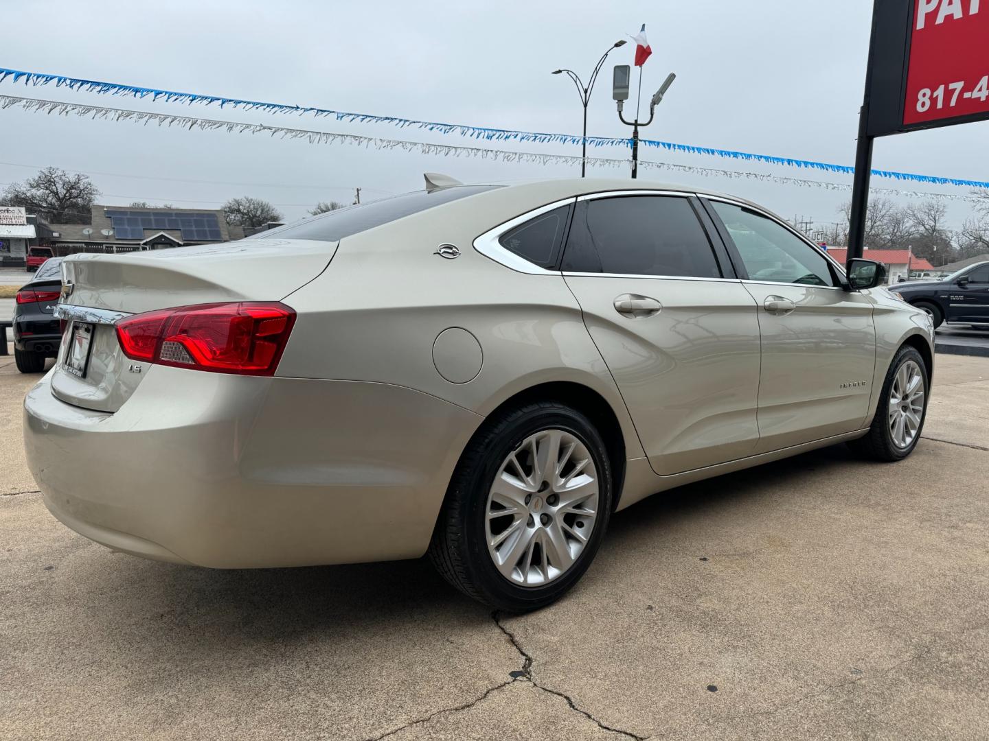 2015 GOLD /Gray CHEVROLET IMPALA LS Fleet 4dr Sedan (2G11X5SL7F9) with an 2.5L I4 engine, Automatic 6-Speed transmission, located at 5900 E. Lancaster Ave., Fort Worth, TX, 76112, (817) 457-5456, 0.000000, 0.000000 - This is a 2015 Chevrolet Impala LS Fleet 4dr Sedan that is in excellent condition. There are no dents or scratches. The interior is clean with no rips or tears or stains. All power windows, door locks and seats. Ice cold AC for those hot Texas summer days. It is equipped with a CD player, AM/FM radi - Photo#3